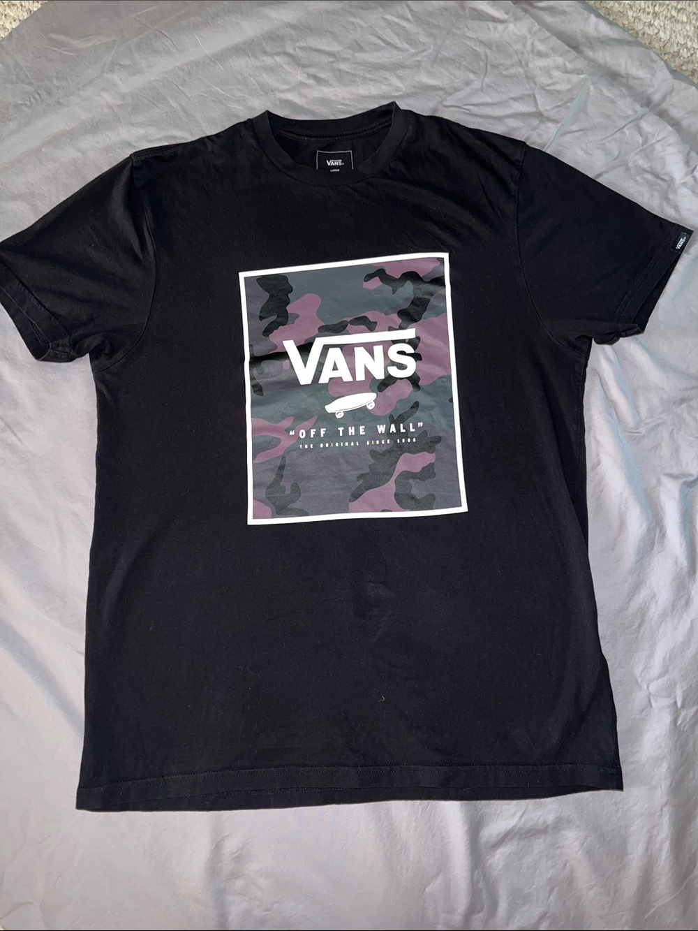 Vans black T-shirt with camo icon. Men’s size large.. good condition